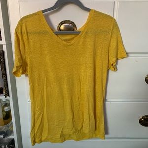 yellow tee.